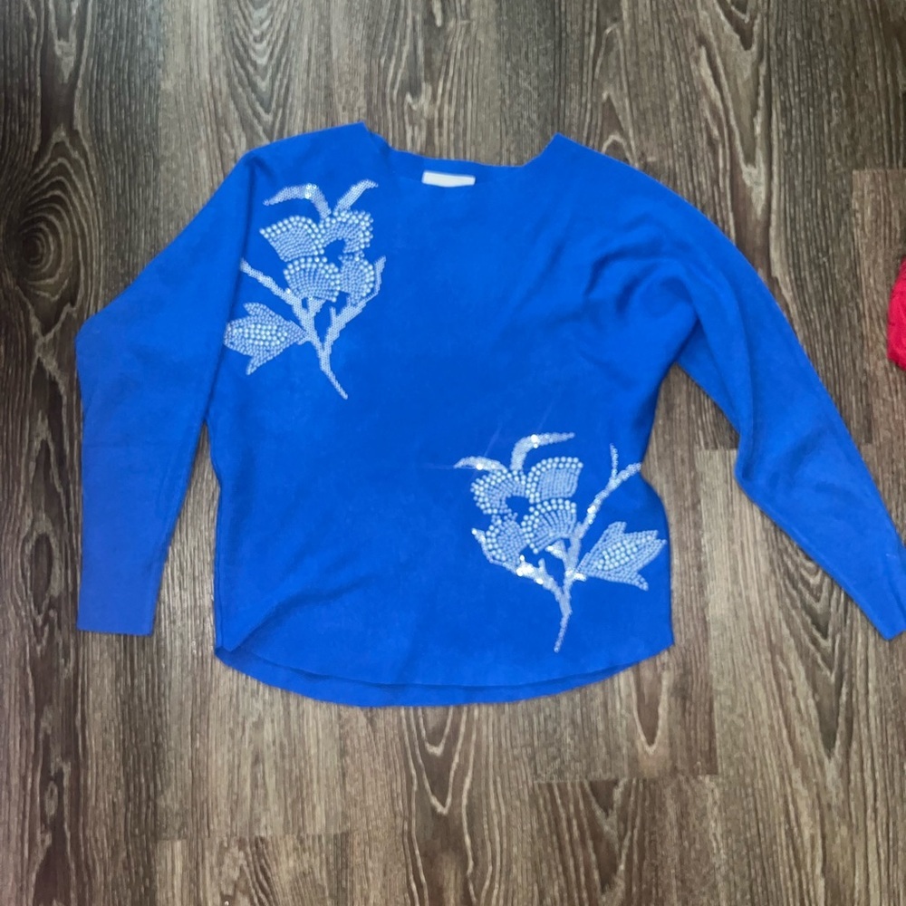 Blue Sweater with Floral Embellishments
